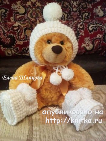 Шапочка - колпачок спицами для малыша. Работа Елены Шляковой